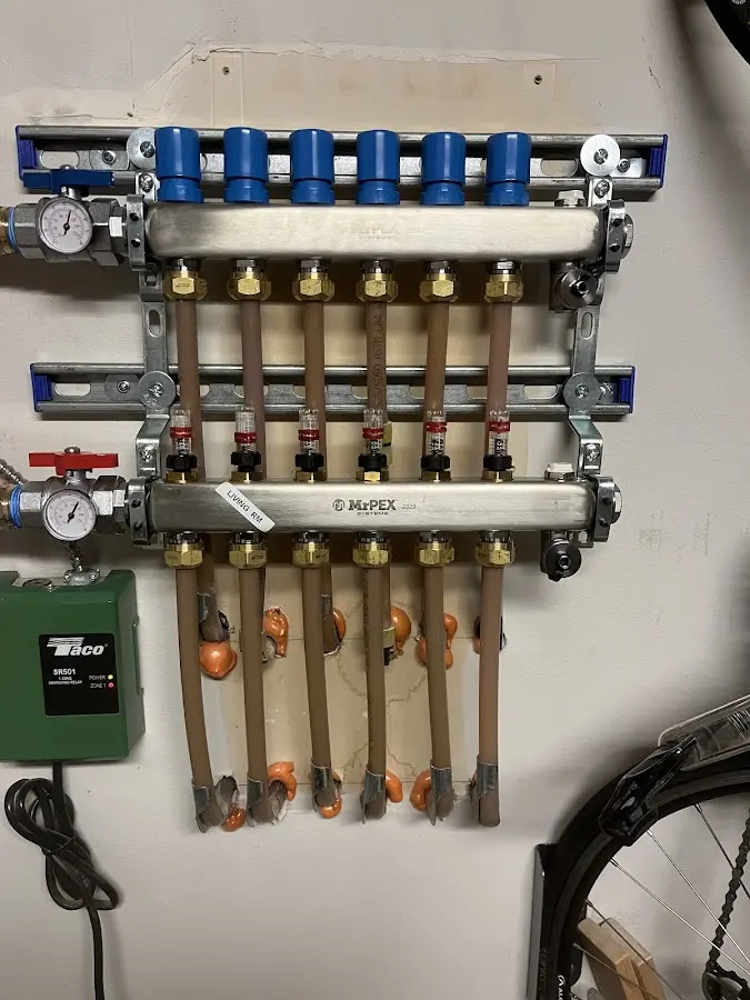 Plumber performing Water Heater Repair at a residential property in Bellwood